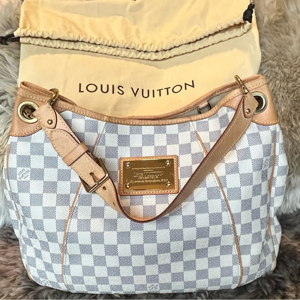 Louie Vuitton White Damier Azure with Authentic Louie Vuitton Dust Bag Included.